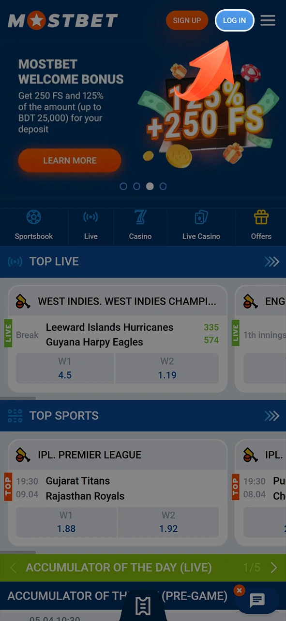 Find the button to log in to your Mostbet account.
